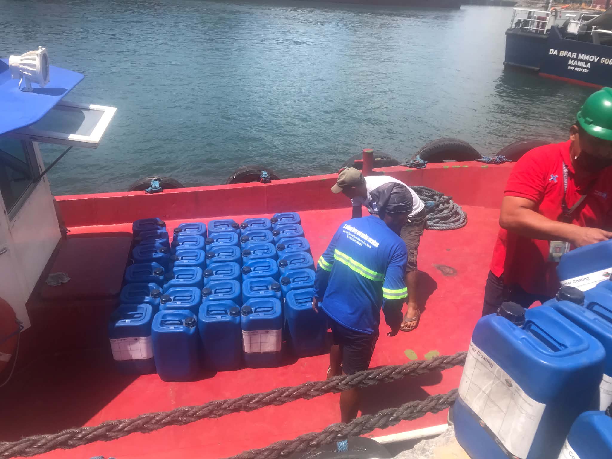 Chemical drums staged on deck for delivery